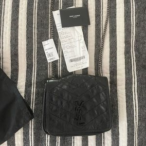 Yves Saint Laurent cross body, leather with silver chain.